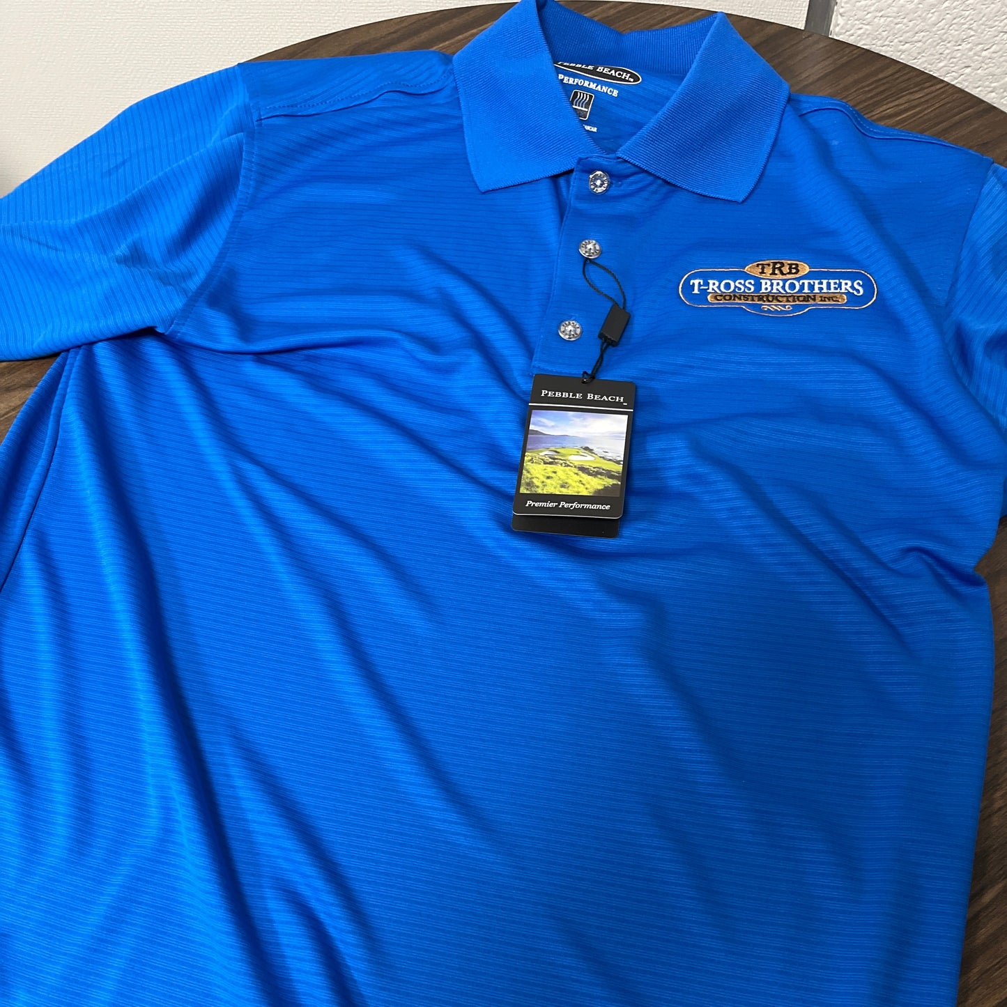 T-Ross Brothers Construction Performance Polo – Bright Royal Blue