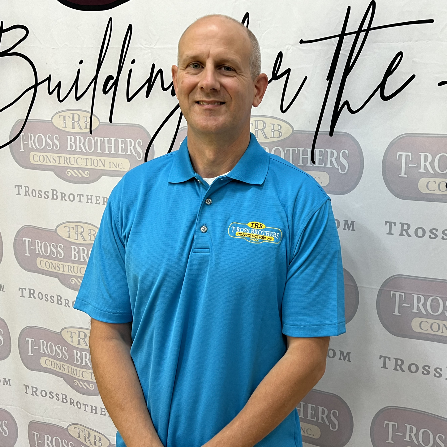 T-Ross Brothers Construction Performance Polo – Light Blue